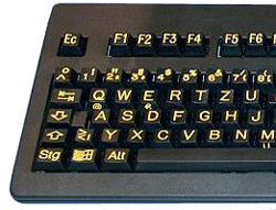 Schwarze Grossschrifttastatur mit gelben Buchstaben